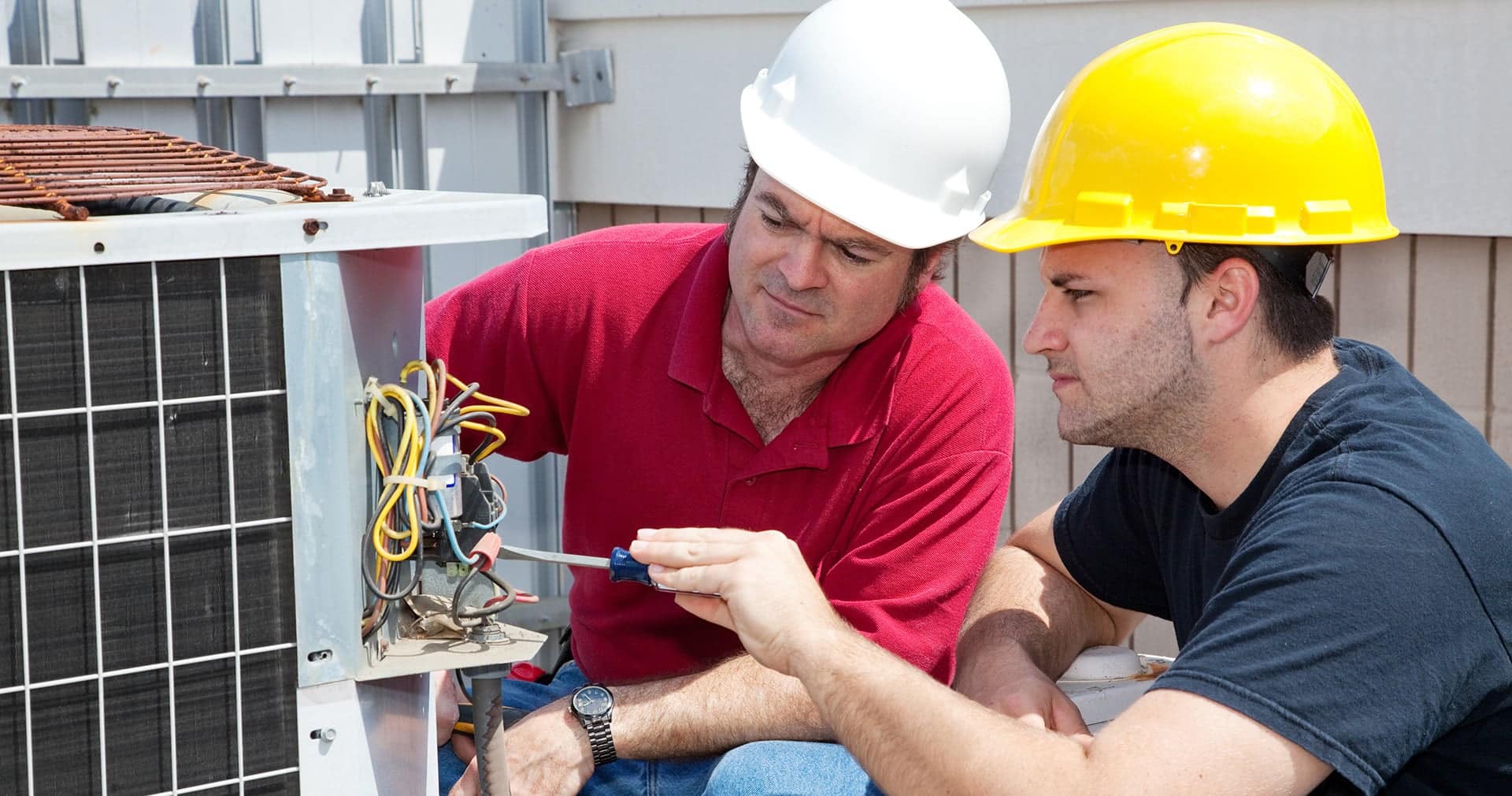 HVAC-Tech-Being-Trained-By-an-Experienced-Tech
